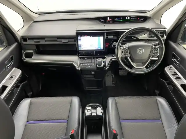 ホンダ ステップワゴン スパーダ ハイブリッドG EX HセンシングBスタイ 岡山県 2019(平31)年 7万km プレミアムスパークルブラックパール 純正１０インチナビ　/（CD/DVD/Bluetooth/フルセグ）/フリップダウンモニター　/衝突軽減ブレーキ　/両側電動スライド /アラウンドビューモニター /レーダークルーズコントロール /ビルトインETC /シートヒーター/LEDヘッドライト /オートハイビーム/ブラインドスポットモニター/プッシュスタート/USB接続/スマートキー/アイドリングストップ/ミュージックサーバー/ミュージックプレーヤー接続
