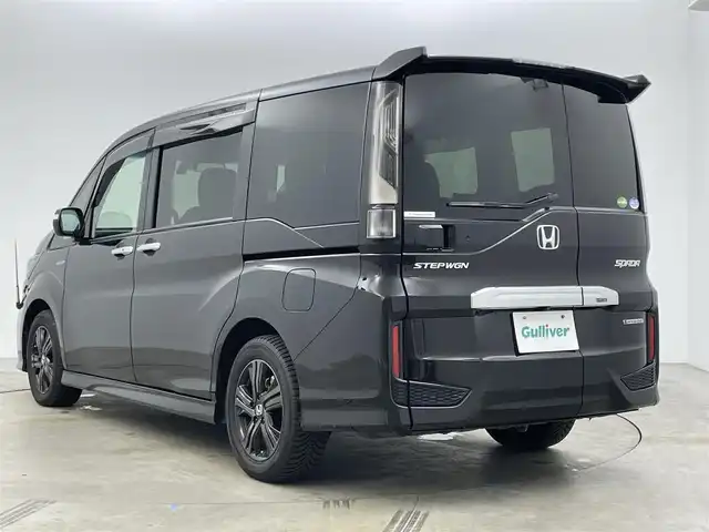 ホンダ ステップワゴン スパーダ ハイブリッドG EX HセンシングBスタイ 岡山県 2019(平31)年 7万km プレミアムスパークルブラックパール 純正１０インチナビ　/（CD/DVD/Bluetooth/フルセグ）/フリップダウンモニター　/衝突軽減ブレーキ　/両側電動スライド /アラウンドビューモニター /レーダークルーズコントロール /ビルトインETC /シートヒーター/LEDヘッドライト /オートハイビーム/ブラインドスポットモニター/プッシュスタート/USB接続/スマートキー/アイドリングストップ/ミュージックサーバー/ミュージックプレーヤー接続