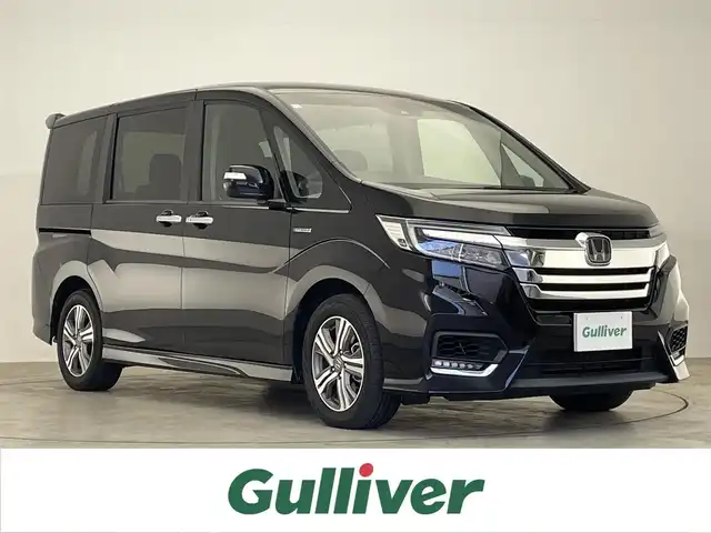 ホンダ ステップワゴン スパーダ ハイブリッド G ホンダセンシング 滋賀県 2018(平30)年 6.8万km プレミアムスパークルブラックパール 後期型/ハイブリッドモデル/純正大型9インチナビゲーション/純正フリップダウンモニター/CD/DVD/Bluetooth/フルセグTV/バックカメラ/両側電動スライドドア/アダプティブクルーズコントロール/レーダーブレーキサポート/レーンキープ/LEDヘッドライト/わくわくゲート/スマートキー/スペアキー/純正16インチアルミホイール/ETC/新車保証書