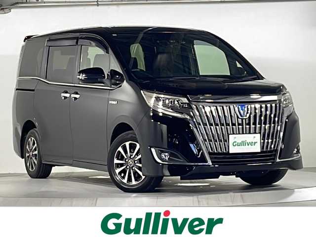 トヨタ エスクァイア ハイブリッド Gi プレミアムパッケージ 広島県 2018(平30)年 8.3万km ブラック トヨタセーフティセンス/アルパイン９型ナビ(X9Z)/CD/DVD/SD/BT/フルセグTV/アルパイン10.1型フリップダウンモニター/アルパインデジタルミラー（前後ドラレコ）/プリクラッシュセーフティ/レーンディパーチャーアラート/オートハイビーム/クルーズコントロール/両側パワースライドドア/ハーフレザーシート/シートヒーター/ハンドルヒーター/ウッドコンビステアリング/LEDオートライト/ドアバイザー/フロアマット/スマートキー/プッシュスタート