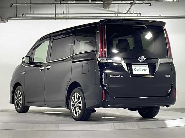 トヨタ エスクァイア ハイブリッド Gi プレミアムパッケージ 広島県 2018(平30)年 8.3万km ブラック トヨタセーフティセンス/アルパイン９型ナビ(X9Z)/CD/DVD/SD/BT/フルセグTV/アルパイン10.1型フリップダウンモニター/アルパインデジタルミラー（前後ドラレコ）/プリクラッシュセーフティ/レーンディパーチャーアラート/オートハイビーム/クルーズコントロール/両側パワースライドドア/ハーフレザーシート/シートヒーター/ハンドルヒーター/ウッドコンビステアリング/LEDオートライト/ドアバイザー/フロアマット/スマートキー/プッシュスタート