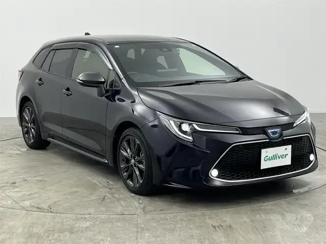 トヨタ カローラツーリング ハイブリッド ダブルバイビー 愛知県 2021(令3)年 2.8万km スパークリングブラックパールクリスタルシャイン 純正9インチディスプレオーディオ/・フルセグテレビ/・Bluetooth接続/・AM/FMラジオ/・USB入力端子/・交通情報/・Miracast/シートヒーター/ステアリングヒーター/バックカメラ/スマートキー/プッシュスタート/ETC2.0/ドライブレコーダー/Toyota Safty Sense/・プリクラッシュセーフティ/・レーントレーシングアシスト/・レーダークルーズコントロール(全車速追従機能付)/・オートマチックハイビーム/・ロードサインアシスト/インテリジェントクリアランスソナー/車両接近通報装置/先行車発進告知機能/純正17インチアルミホイール/