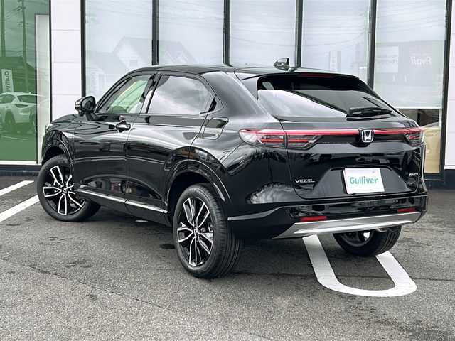 ホンダ ヴェゼル ハイブリッド e:HEV Z 岐阜県 2025(令7)年 0.1千km クリスタルブラックパール 登録時走行距離4km/純正９型ナビ/バックカメラ/スマートキー/プッシュスタート/スペアキー/ハーフレザーシート/電動リアゲート/純正アルミホイール/前後コーナーセンサー/レーンキープアシスト/クルーズコントロール/ステアリングヒーター/LEDヘッドライト/オートライト/フォグランプ/パーキングアシスト/ダウンヒルアシストコントロール/ＥＴＣ