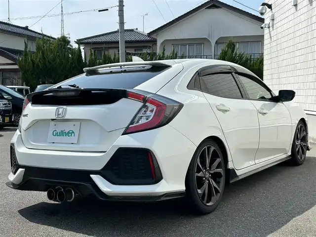 ホンダ シビック ハッチバック ホンダセンシング 山形県 2018(平30)年 7.1万km ホワイトオーキッドパール 6速マニュアル/ナビ装着用スペシャルパッケージ/ホンダセンシング/カロッツェリアSDナビ//BT/CD/DVD/フルセグテレビ/電動パーキング・ブレーキホールド/純正ビルトインETC/社外サス（純正有り）/柿本改マフラー/レーダー探知機/純正18インチアルミホイール/追従式クルーズコントロール/LEDヘッドライト/ドアバイザー/バックカメラ