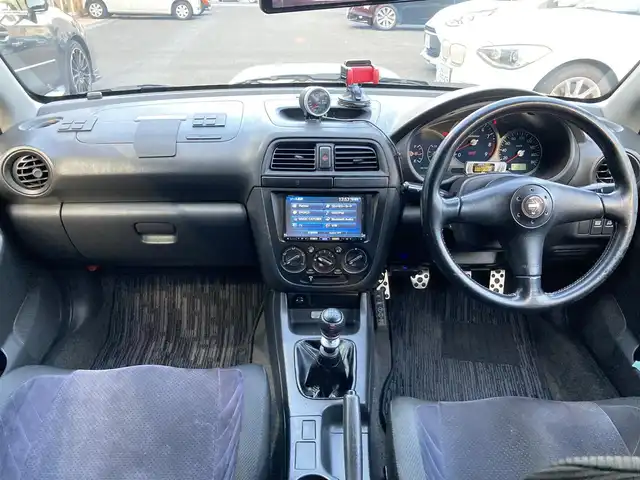 スバル インプレッサ ＷＲＸ S202 STiバージョン 長崎県 2002(平14)年 12.2万km ピュアホワイト 登録時122009km/400台限定車/S202　046/400/社外ナビ/Bluetoothaudio/TV/DVD/6MT/ターボタイマー/STI17インチアルミホイール/HKS車高調/HKSマフラー/bremboキャリパー/タワーバー