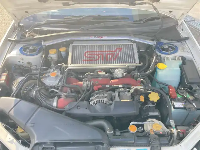 スバル インプレッサ ＷＲＸ S202 STiバージョン 長崎県 2002(平14)年 12.2万km ピュアホワイト 登録時122009km/400台限定車/S202　046/400/社外ナビ/Bluetoothaudio/TV/DVD/6MT/ターボタイマー/STI17インチアルミホイール/HKS車高調/HKSマフラー/bremboキャリパー/タワーバー