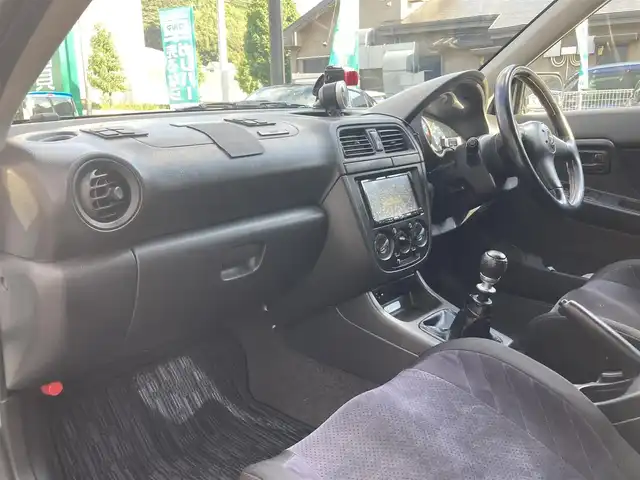 スバル インプレッサ ＷＲＸ S202 STiバージョン 長崎県 2002(平14)年 12.2万km ピュアホワイト 登録時122009km/400台限定車/S202　046/400/社外ナビ/Bluetoothaudio/TV/DVD/6MT/ターボタイマー/STI17インチアルミホイール/HKS車高調/HKSマフラー/bremboキャリパー/タワーバー