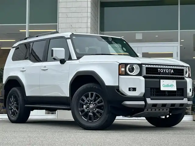 トヨタ ランドクルーザー ２５０ VX 兵庫県 2024(令6)年 0.1万km プラチナホワイトパールマイカ 純正12.3インチDAナビ/BTオーディオ/フルセグテレビ/全方位カメラ/ETC2.0/デジタルインナーミラー/モデリスタパッケージ/ルーフレール/純正18インチAW/LEDヘッドライト/オートマチックハイビーム/パワーバックドア/パワーシート