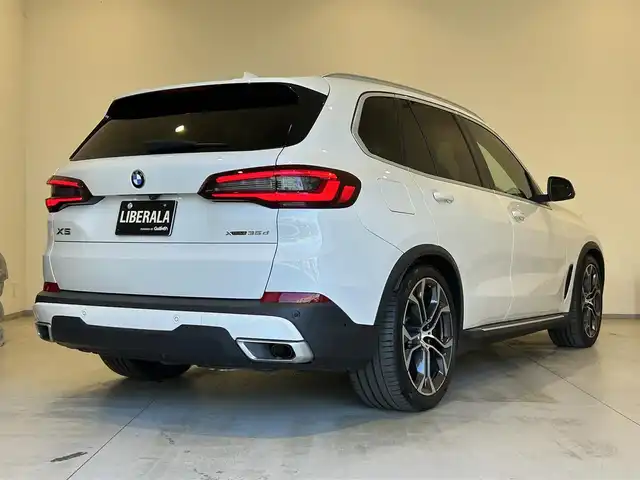 ＢＭＷ ＢＭＷ Ｘ５ xDrive 35d プレジャー3ED 熊本県 2021(令3)年 2.3万km 白 プレジャー3エディション/・純正エアサスペンションシステム/・純正21インチアロイアルミホイール/・ヘッドアップディスプレイ/・ブラックフルレザーシート/シートヒーター/パワーシート/パノラマサンルーフ/純正HDDナビ/AppleCarPlay/Bluetooth/USB/フルセグテレビ/ハーマンカードンサラウンドシステム/360°カメラ/コーナーセンサー/パーキングアシスト/Aクルーズコントロール/ワイヤレス充電/パワートランクドア/ETC2.0/インテリジェントセーフティー/ブレーキアシスト/ブラインドスポットモニター/コンフォートアクセス/LEDヘッドライト/LEDフォグライト/オートマチックハイビーム