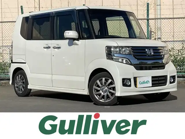 ホンダ Ｎ ＢＯＸ カスタム G SSパッケージ 東京都 2014(平26)年 10.6万km プレミアムホワイトパール カロツェリアナビ/＜フルセグ/SD/CD/DVD/BT＞/両側パワースライドドア/ＥＣＯＮ/あんしんパッケージ/＜シティブレーキアクティブシステム/前席用i-サイドエアバックシステム/サイドカーテンエアバックシステム＞/プラズマクラスター搭載ＡＡＣ/アレルクリーンシート/純正フロアマット/ドアバイザー/純正フルエアロ/プッシュスタート/横滑り制御機能/キセノンヘッドライト/フロントフォグランプ