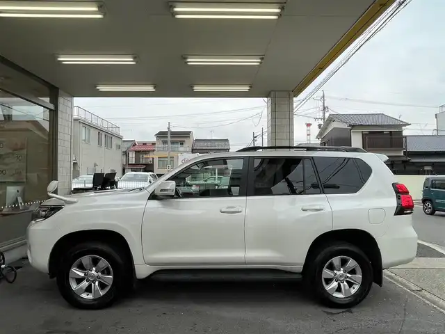 トヨタ ランドクルーザー プラド TX 愛知県 2019(平31)年 7.3万km ホワイトパールクリスタルシャイン /当店買取/禁煙/1オーナー/ディーゼル/ターボ/7人乗//社外ナビMDV-S706L//フルセグTV/CD/DVD/SD/ Bluetooth/USB/ipod//バックカメラ//PCS/LDA/レーダークルーズコントロール//カーテンエアバック//LEDヘッド/Aライト/AHB/LEDフォグ//ドラレコ/ETC//保証書/取説/スペアキー