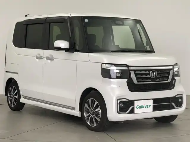ホンダ Ｎ ＢＯＸ カスタム 愛知県 2024(令6)年 0.4万km プラチナホワイトパール ホンダ純正ギャザーズナビ/（フルセグ/ラジオ/BT）/バックカメラ/ETC/前席シートヒーター/片側パワースライドドア/追従クルーズコントロール/衝突軽減システム/横滑り防止/レーンキープアシスト/コーナーセンサー前後/ブラインドスポットモニター/フォグランプ/純正AW/スペアキー