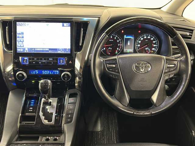トヨタ ヴェルファイア Z Gエディション 道央・札幌 2018(平30)年 4.5万km ブラック /4WD//寒冷地仕様//LEDヘッドライト//社外製メモリナビ//社外製フルセグテレビ//バックカメラ//フリップダウンモニター//アイドリングストップ//オットマン//追従機能付きクルーズコントロール//ドアバイザー//プッシュスタート//両側パワースライドドア//パワーバックドア//ETC//レザーシート//ステアリングヒーター//純正18インチアルミホイールサマータイヤ付き
