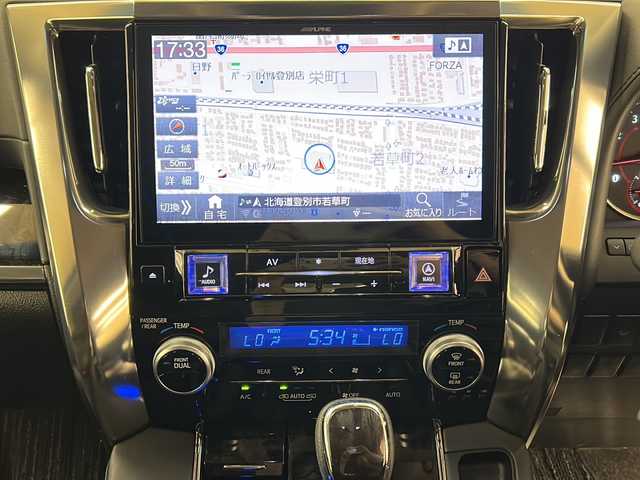 トヨタ ヴェルファイア Z Gエディション 道央・札幌 2018(平30)年 4.5万km ブラック /4WD//寒冷地仕様//LEDヘッドライト//社外製メモリナビ//社外製フルセグテレビ//バックカメラ//フリップダウンモニター//アイドリングストップ//オットマン//追従機能付きクルーズコントロール//ドアバイザー//プッシュスタート//両側パワースライドドア//パワーバックドア//ETC//レザーシート//ステアリングヒーター//純正18インチアルミホイールサマータイヤ付き