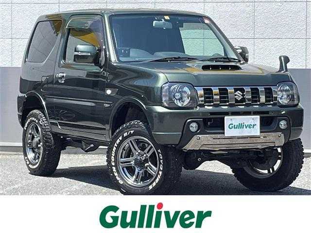スズキ ジムニー ランドベンチャー 東京都 2018(平30)年 2.1万km クールカーキPM ４WD/純正メモリ-ナビ(CN-E204Z)/CD/FM・AM/AUX/SD//ワンセグTV/バックカメラ/社外フロントカメラ/ETC/ドライブレコーダー前後/レザーシート/シートヒーター/３インチリフトアップ（タニグチ）/社外ヒッチメンバー(SOREX）/LEDヘッドライト/ヘッドライトレベライザー/ドアバイザー/純正フロアマット/スペアキー/純正１６インチAW/オープンカントリーR/Tオフロードタイヤ/保証書/取扱説明書