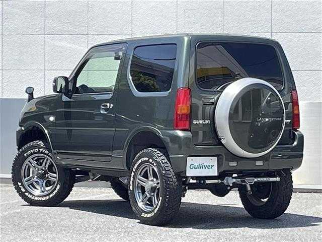 スズキ ジムニー ランドベンチャー 東京都 2018(平30)年 2.1万km クールカーキPM ４WD/純正メモリ-ナビ(CN-E204Z)/CD/FM・AM/AUX/SD//ワンセグTV/バックカメラ/社外フロントカメラ/ETC/ドライブレコーダー前後/レザーシート/シートヒーター/３インチリフトアップ（タニグチ）/社外ヒッチメンバー(SOREX）/LEDヘッドライト/ヘッドライトレベライザー/ドアバイザー/純正フロアマット/スペアキー/純正１６インチAW/オープンカントリーR/Tオフロードタイヤ/保証書/取扱説明書
