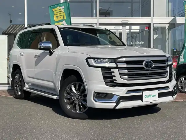 トヨタ ランドクルーザー ZX 道央・札幌 2023(令5)年 0.8万km プレシャスホワイトパール 【グレード：ZXガソリン7人乗 4WD】/モデリスタエアロ/サンルーフ/JBLサウンド/リアエンターテイメント/ヘッドレストモニター/フルレザーシート/（前シート/2列目シートヒーター&ベンチレーター）/Tコネクトナビ/（BlueTooth フルセグTV DVD CD USB入力）/パノラミックビューモニター/（フロント/サイド/バックカメラ）/センター/リアデフロック/トヨタセーフティセンス/クリアランスソナー/レーダークルコン/BSM/コンソールクーラーBOX