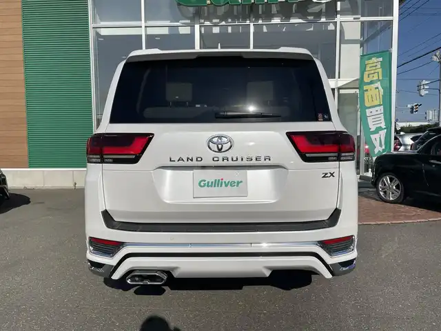 トヨタ ランドクルーザー ZX 道央・札幌 2023(令5)年 0.8万km プレシャスホワイトパール 【グレード：ZXガソリン7人乗 4WD】/モデリスタエアロ/サンルーフ/JBLサウンド/リアエンターテイメント/ヘッドレストモニター/フルレザーシート/（前シート/2列目シートヒーター&ベンチレーター）/Tコネクトナビ/（BlueTooth フルセグTV DVD CD USB入力）/パノラミックビューモニター/（フロント/サイド/バックカメラ）/センター/リアデフロック/トヨタセーフティセンス/クリアランスソナー/レーダークルコン/BSM/コンソールクーラーBOX