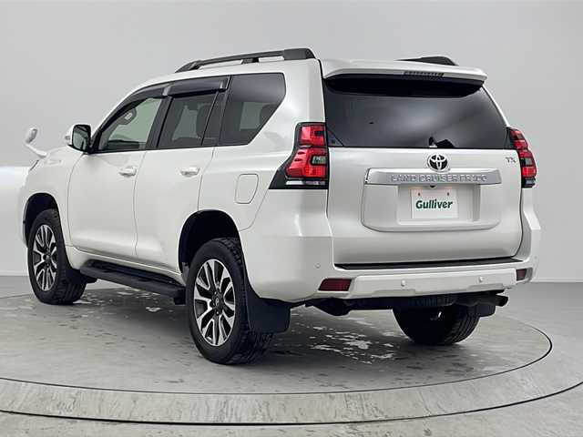 トヨタ ランドクルーザー プラド TX Lパッケージ 熊本県 2022(令4)年 3.2万km ホワイトパールクリスタルシャイン 禁煙車/パートタイム4WD/トヨタセーフティセンス/社外ナビTV/（ストラーダ/CN-HE01WD/CD/DVD/Bluetooth/フルセグTV)/純正LEDオートライト/純正LEDフォグ/純正19インチアルミ/純正フロアマット/ベージュ本革シート/サンルーフ/プリクラッシュセーフティ/アダプティブクルーズコントロール/レーンディパーチャーアラート/オートマチックハイビーム/クリアランスソナー/前席パワーシート/エアシート/デュアルオートエアコン/電動格納シート/本革巻ハンドル/ルーフレール/ETC/スマートキー/プッシュエンジンスタート/スペアキー/新車時保証書/取扱い説明書