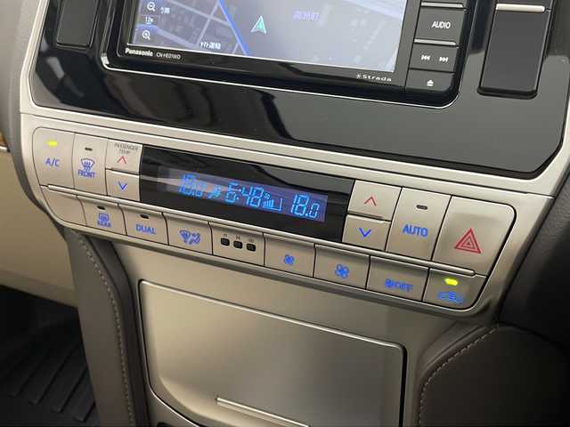 トヨタ ランドクルーザー プラド TX Lパッケージ 熊本県 2022(令4)年 3.2万km ホワイトパールクリスタルシャイン 禁煙車/パートタイム4WD/トヨタセーフティセンス/社外ナビTV/（ストラーダ/CN-HE01WD/CD/DVD/Bluetooth/フルセグTV)/純正LEDオートライト/純正LEDフォグ/純正19インチアルミ/純正フロアマット/ベージュ本革シート/サンルーフ/プリクラッシュセーフティ/アダプティブクルーズコントロール/レーンディパーチャーアラート/オートマチックハイビーム/クリアランスソナー/前席パワーシート/エアシート/デュアルオートエアコン/電動格納シート/本革巻ハンドル/ルーフレール/ETC/スマートキー/プッシュエンジンスタート/スペアキー/新車時保証書/取扱い説明書