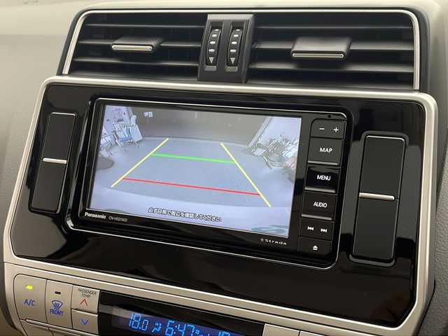 トヨタ ランドクルーザー プラド TX Lパッケージ 熊本県 2022(令4)年 3.2万km ホワイトパールクリスタルシャイン 禁煙車/パートタイム4WD/トヨタセーフティセンス/社外ナビTV/（ストラーダ/CN-HE01WD/CD/DVD/Bluetooth/フルセグTV)/純正LEDオートライト/純正LEDフォグ/純正19インチアルミ/純正フロアマット/ベージュ本革シート/サンルーフ/プリクラッシュセーフティ/アダプティブクルーズコントロール/レーンディパーチャーアラート/オートマチックハイビーム/クリアランスソナー/前席パワーシート/エアシート/デュアルオートエアコン/電動格納シート/本革巻ハンドル/ルーフレール/ETC/スマートキー/プッシュエンジンスタート/スペアキー/新車時保証書/取扱い説明書