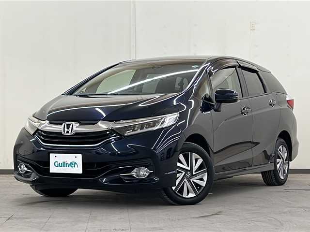 ホンダ シャトル ハイブリッド X 道央・札幌 2017(平29)年 7万km ミッドナイトブルービームM /4WD//社外メモリナビ：AVIC-RZ800/（CD/DVD/SD/BT/ラジオ/フルセグ）//寒冷地仕様//ビルトインETC//フロントワイパーデアイサー//ステアリングスイッチ//横滑り防止装置//社外ドライブレコーダー（前後録画）//オートライト//フォグライト//オートエアコン//プッシュスタート//スペアキー1本
