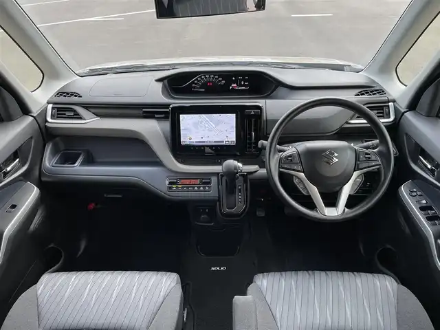 スズキ ソリオ HV MX 東京都 2025(令7)年 0.2万km キャラバンアイボリーPM ワンオーナー　/純正９型メモリナビ＆フルセグ　/・ＢｌｕｅｔｏｏｔｈＡｕｄｉｏ　/・ＡｐｐｌｅＣａｒＰｌａｙ/Ａｎｄｒｏｉｄ /・CD/DVD/AM/FM/両側パワースライドドア/アラウンドビューモニター/ セーフティサポート /（予防安全技術）/・デュアアルカメラブレーキサポート/・誤発進抑制機能/・後方誤発進抑制機能/・低速時ブレーキサポート/・パーキングセンサー/（フロント＆リア）/・車線逸脱抑制機能/・発進お知らせ機能/・車線逸脱抑制機能/・ふらつき警報/プッシュエンジンスタート/保証書＆取説