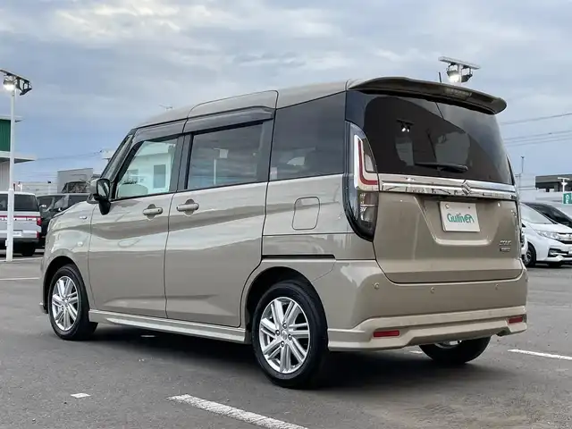 スズキ ソリオ HV MX 東京都 2025(令7)年 0.2万km キャラバンアイボリーPM ワンオーナー　/純正９型メモリナビ＆フルセグ　/・ＢｌｕｅｔｏｏｔｈＡｕｄｉｏ　/・ＡｐｐｌｅＣａｒＰｌａｙ/Ａｎｄｒｏｉｄ /・CD/DVD/AM/FM/両側パワースライドドア/アラウンドビューモニター/ セーフティサポート /（予防安全技術）/・デュアアルカメラブレーキサポート/・誤発進抑制機能/・後方誤発進抑制機能/・低速時ブレーキサポート/・パーキングセンサー/（フロント＆リア）/・車線逸脱抑制機能/・発進お知らせ機能/・車線逸脱抑制機能/・ふらつき警報/プッシュエンジンスタート/保証書＆取説