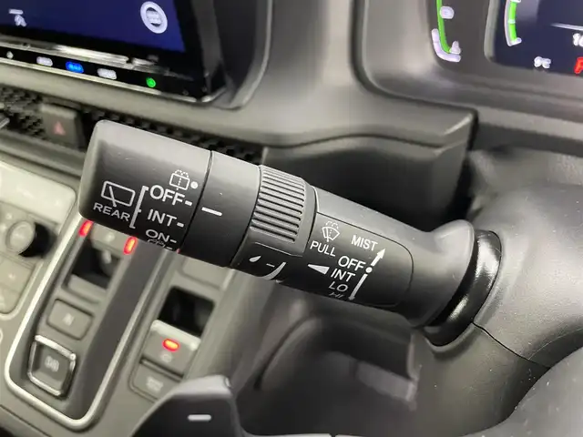 ホンダ ステップワゴン スパーダ eHEV 富山県 2025(令7)年 0.1千km クリスタルブラックパール 純正11.4型ナビ（AM/FM/DVD/BT/USB/フルセグ）/バックカメラ/純正15.6型後席モニター/両側パワースライドドア/パワーバックドア/ハーフレザーシート/D/N席シートヒーター/ブラインドスポットモニター/衝突被害軽減システム/レーダークルーズコントロール/レーンキープアシスト/コーナーセンサー/アイドリングストップ/純正アルミホイール/オートLEDライト/フォグライト/革巻きステアリング/ステアリングスイッチ/パドルシフト/スマートキー/スペアキー
