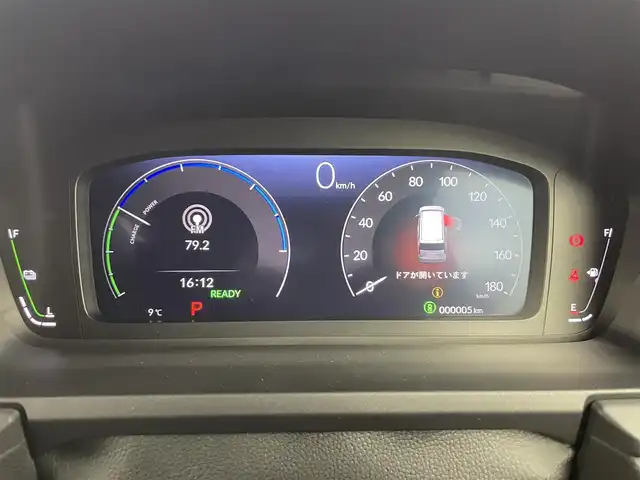 ホンダ ステップワゴン スパーダ eHEV 富山県 2025(令7)年 0.1千km クリスタルブラックパール 純正11.4型ナビ（AM/FM/DVD/BT/USB/フルセグ）/バックカメラ/純正15.6型後席モニター/両側パワースライドドア/パワーバックドア/ハーフレザーシート/D/N席シートヒーター/ブラインドスポットモニター/衝突被害軽減システム/レーダークルーズコントロール/レーンキープアシスト/コーナーセンサー/アイドリングストップ/純正アルミホイール/オートLEDライト/フォグライト/革巻きステアリング/ステアリングスイッチ/パドルシフト/スマートキー/スペアキー