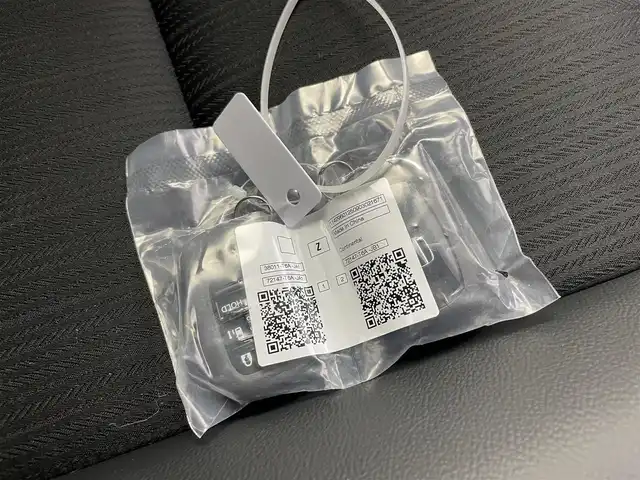 ホンダ ステップワゴン スパーダ eHEV 富山県 2025(令7)年 0.1千km クリスタルブラックパール 純正11.4型ナビ（AM/FM/DVD/BT/USB/フルセグ）/バックカメラ/純正15.6型後席モニター/両側パワースライドドア/パワーバックドア/ハーフレザーシート/D/N席シートヒーター/ブラインドスポットモニター/衝突被害軽減システム/レーダークルーズコントロール/レーンキープアシスト/コーナーセンサー/アイドリングストップ/純正アルミホイール/オートLEDライト/フォグライト/革巻きステアリング/ステアリングスイッチ/パドルシフト/スマートキー/スペアキー