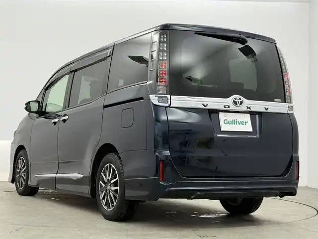 トヨタ ヴォクシー V 愛知県 2014(平26)年 8.4万km ブラッキッシュアゲハガラスフレーク 純正7インチナビ/バックカメラ/フルセグTV/モデリスタエアロ/横滑り防止装置/オートライト/LEDヘッドライト/フォグランプ/片側パワースライドドア/前後ドライブレコーダー/ETC/自動防眩式ミラー/純正AW/純正フロアマット/プッシュスタート/スマートキー