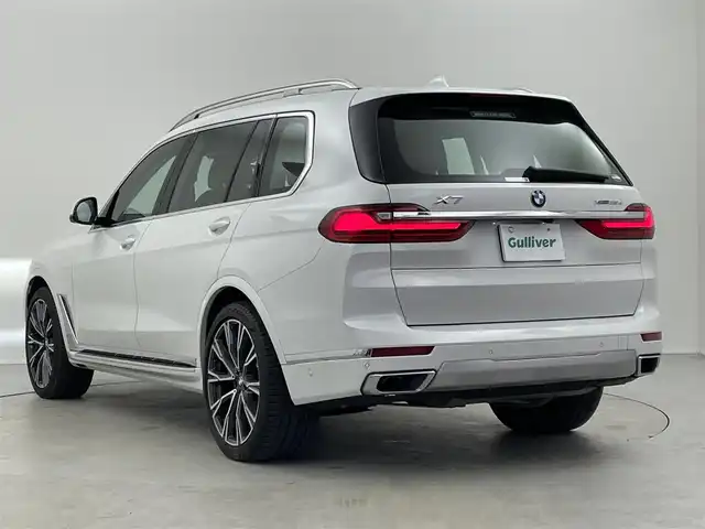 ＢＭＷ Ｘ７ xDrive35d デザインピュアエクセレンス 埼玉県 2020(令2)年 2.3万km ミネラルホワイト 純正ナビ　アラウンドビューモニター　スカイラウンジパノラマガラスルーフ　ハーマンカードンサウンド　２２インチＹスポークアルミホイール　二列目コンフォートシート　茶革シート　エアシート　ワイヤレス充電 ヘッドアップディスプレイ BSM エアサス F/Rパークディスタンスコントロール アルミニウムランニングボード ピアノフィニッシュブラックインテリアトリム 5ゾーンエアコン