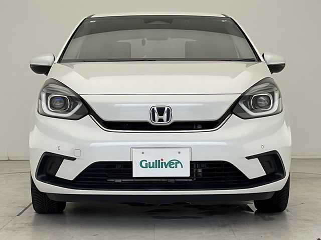 ホンダ フィット e:HEVホーム 愛知県 2020(令2)年 4.4万km プラチナホワイトパール ホンダセンシング/衝突軽減システム/純正９型SDナビ/レーダークルーズコントロール/フルセグ/CD/Bluetooth/バックカメラ/コーナーセンサー/LEDヘッドライト/オートマチックハイビーム/ドライブレコーダー/ETC/ステアリングスイッチ/スマートキー/プッシュスタート