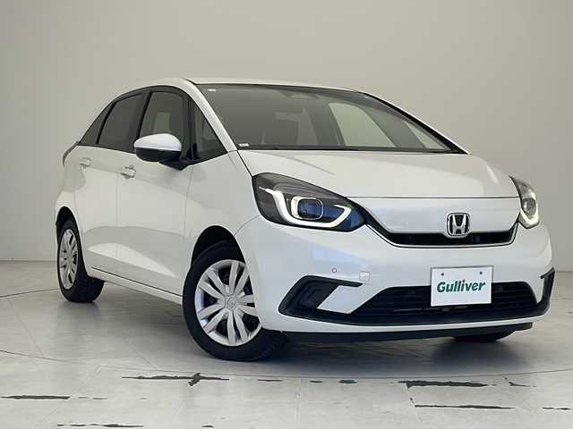 ホンダ フィット e:HEVホーム 沖縄県 2020(令2)年 4.4万km プラチナホワイトパール 純正９型SDナビ(VXU-205FTi)/　（フルセグTV/CD/Bluetooth）/バックカメラ/ドライブレコーダー/ETC/ホンダセンシング/衝突軽減システム/レーダークルーズコントロール/コーナーセンサー/LEDヘッドライト/オートマチックハイビーム/ステアリングスイッチ/スマートキー/プッシュスタート