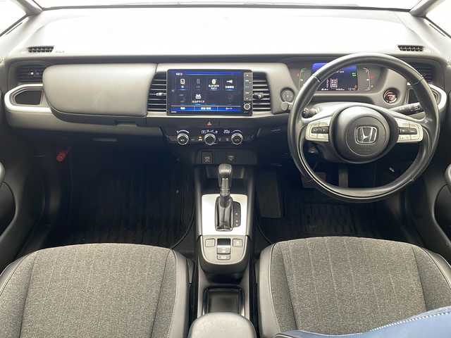 ホンダ フィット e:HEVホーム 沖縄県 2020(令2)年 4.4万km プラチナホワイトパール 純正９型SDナビ(VXU-205FTi)/　（フルセグTV/CD/Bluetooth）/バックカメラ/ドライブレコーダー/ETC/ホンダセンシング/衝突軽減システム/レーダークルーズコントロール/コーナーセンサー/LEDヘッドライト/オートマチックハイビーム/ステアリングスイッチ/スマートキー/プッシュスタート