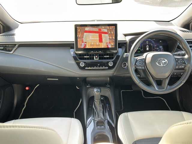 トヨタ カローラツーリング ハイブリッド ダブルバイビー 香川県 2023(令5)年 4.1万km アティチュードブラックマイカ 純正ナビ（フルセグTV/BT)/バックカメラ/ステアリングヒーター/ブラインドスポットモニター/ヘッドライトレベライザー/後退時交差車両検知警報システム/安心降車アシスト/ロードサインアシスト/シートヒーター/コーナーセンサー/オートライト/アイドリングストップ/ビルトインETC2.0