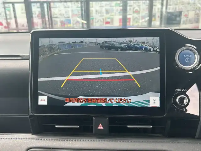 トヨタ ヴォクシー ハイブリッド S－Z 千葉県 2023(令5)年 4.4万km アティチュードブラックマイカ 純正10.5インチナビ/(AM FM フルセグTV HDMI CD DVD)/バックカメラ/14インチフリップダウンモニター/衝突被害軽減システム/車線逸脱警報/クルーズコントロール/ハーフレザーシート/両側パワースライドドア/横滑り防止装置/ビルトインETC2.0/LEDヘッドライト/フォグランプ/オートライト/ウィンカーミラー/電動格納ミラー/純正17インチAW/シートヒーター/シートリフター/プッシュスタート/スマートキー/フロアマット/ドアバイザー/取扱説明書
