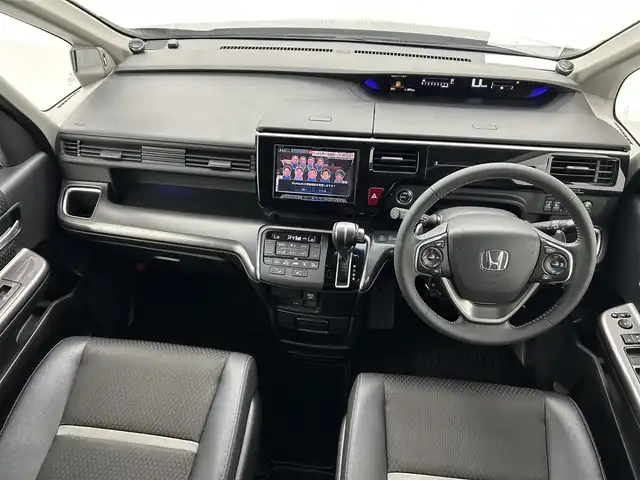 ホンダ ステップワゴン スパーダ クルスピセンシング 熊本県 2018(平30)年 6.6万km モダンスティールM 社外ナビPVIC-CL902（ＣＤ・ＤＶＤ・フルセグ・ＢＴ・ＳＤ・ＵＳＢ）/バックカメラ　/ビルトインＥＴＣ　/両側パワースライドドア　/クルーズコントロール　/前席シートヒーター　/衝突軽減ブレーキ　/レーンキープアシスト/先行車発進お知らせ機能/横滑り防止/アイドリングストップ/ハーフレザーシート/純正フロアマット/純正17インチAW/オートライト/LEDヘッドライト/スマートキー/プッシュスタート