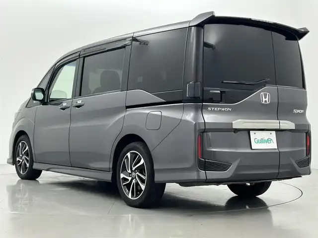 ホンダ ステップワゴン スパーダ クルスピセンシング 熊本県 2018(平30)年 6.6万km モダンスティールM 社外ナビPVIC-CL902（ＣＤ・ＤＶＤ・フルセグ・ＢＴ・ＳＤ・ＵＳＢ）/バックカメラ　/ビルトインＥＴＣ　/両側パワースライドドア　/クルーズコントロール　/前席シートヒーター　/衝突軽減ブレーキ　/レーンキープアシスト/先行車発進お知らせ機能/横滑り防止/アイドリングストップ/ハーフレザーシート/純正フロアマット/純正17インチAW/オートライト/LEDヘッドライト/スマートキー/プッシュスタート