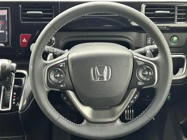 ホンダ ステップワゴン スパーダ クルスピセンシング 熊本県 2018(平30)年 6.6万km モダンスティールM 社外ナビPVIC-CL902（ＣＤ・ＤＶＤ・フルセグ・ＢＴ・ＳＤ・ＵＳＢ）/バックカメラ　/ビルトインＥＴＣ　/両側パワースライドドア　/クルーズコントロール　/前席シートヒーター　/衝突軽減ブレーキ　/レーンキープアシスト/先行車発進お知らせ機能/横滑り防止/アイドリングストップ/ハーフレザーシート/純正フロアマット/純正17インチAW/オートライト/LEDヘッドライト/スマートキー/プッシュスタート