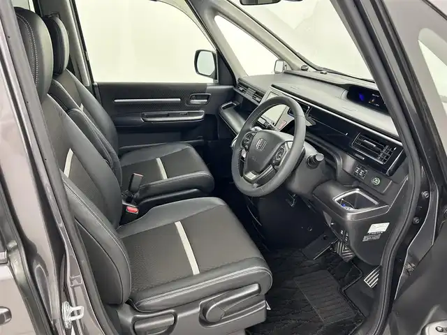 ホンダ ステップワゴン スパーダ クルスピセンシング 熊本県 2018(平30)年 6.6万km モダンスティールM 社外ナビPVIC-CL902（ＣＤ・ＤＶＤ・フルセグ・ＢＴ・ＳＤ・ＵＳＢ）/バックカメラ　/ビルトインＥＴＣ　/両側パワースライドドア　/クルーズコントロール　/前席シートヒーター　/衝突軽減ブレーキ　/レーンキープアシスト/先行車発進お知らせ機能/横滑り防止/アイドリングストップ/ハーフレザーシート/純正フロアマット/純正17インチAW/オートライト/LEDヘッドライト/スマートキー/プッシュスタート