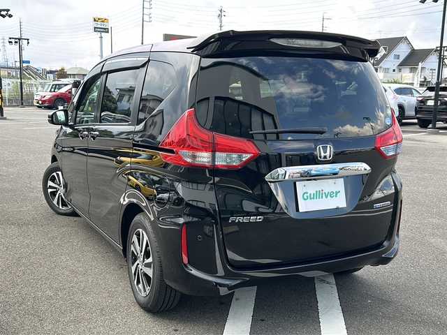 ホンダ フリード ハイブリット G ホンダセンシング 岐阜県 2019(令1)年 5.2万km プレミアムスパークルブラックパール 登録時走行距離：51132km/ワンオーナー/純正9インチナビ/バックカメラ/フルセグテレビ・CD・DVD・Bluetooth/両側パワースライドドア/ハーフレザーシート/ホンダセンシング/レーダークルーズコントロール/レーンキープアシスト/ビルトインETC/LEDヘッドライト/フォグランプ/オートライト/純正15インチアルミホイール/保証書/オーナーズマニュアル