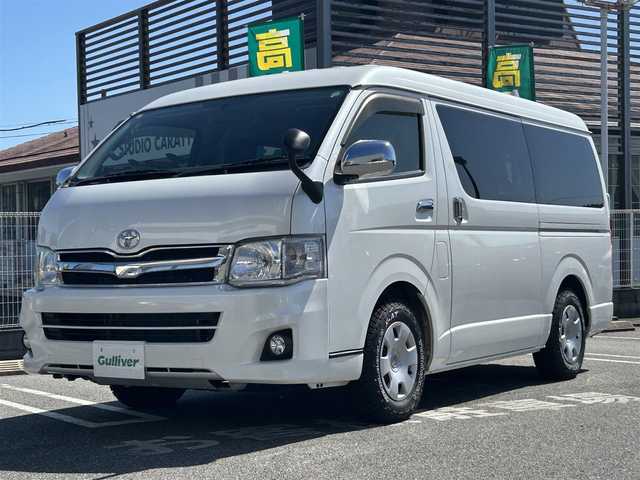 トヨタ ハイエース GL 奈良県 2013(平25)年 3.7万km ホワイトパールクリスタルシャイン インバーターDC電源/i seat ベッドキット/純正ディーラーナビ(VIE-X007W-8)/BT/CD/DVD//シンク付き/室内カーテン/社外後席モニター(ALPINE)/片側パワスラ/社外タイヤ(GEOLANDAR　X-AT)/バックカメラ/ETC/牽引フック/100V充電/オートLEDライト/三列シート/社外フロアマット(Vehicle)/取説・スペアキー付