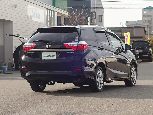 ホンダ シャトル ハイブリッド Z スタイルエディション 山形県 2016(平28)年 7.4万km クリスタルブラックパール 4WD/ワンオーナー/衝突被害軽減システム/純正SDナビ/　　【CD DVD BT フルセグ USB AUX】/バックカメラ/クルーズコントロール/LEDオートライト/ハーフレザー/シートヒーター/純正アルミ/ステアリングスイッチ/パドルシフト/電動格納ウィンカーミラー/フォグランプ/スマートキー/ＥＴＣ