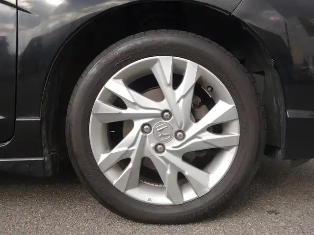 ホンダ シャトル ハイブリッド Z スタイルエディション 山形県 2016(平28)年 7.4万km クリスタルブラックパール 4WD/ワンオーナー/衝突被害軽減システム/純正SDナビ/　　【CD DVD BT フルセグ USB AUX】/バックカメラ/クルーズコントロール/LEDオートライト/ハーフレザー/シートヒーター/純正アルミ/ステアリングスイッチ/パドルシフト/電動格納ウィンカーミラー/フォグランプ/スマートキー/ＥＴＣ