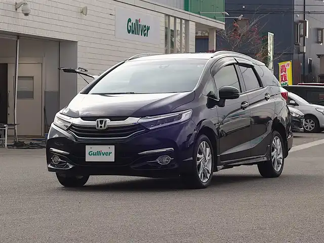 ホンダ シャトル ハイブリッド Z スタイルエディション 山形県 2016(平28)年 7.4万km クリスタルブラックパール 4WD/ワンオーナー/衝突被害軽減システム/純正SDナビ/　　【CD DVD BT フルセグ USB AUX】/バックカメラ/クルーズコントロール/LEDオートライト/ハーフレザー/シートヒーター/純正アルミ/ステアリングスイッチ/パドルシフト/電動格納ウィンカーミラー/フォグランプ/スマートキー/ＥＴＣ