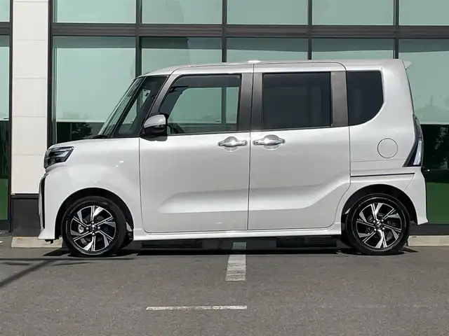 ダイハツ タント カスタム X 和歌山県 2023(令5)年 0.1千km シャイニングホワイトパール 純正7インチナビ（NSZN-W64T）/バックカメラ/フルセグTV/衝突軽減ブレーキ/レーンキープアシスト/前後コーナーセンサー/オートライト/両側パワスラ/シートヒーター/LEDヘッドライト/フォグランプ/電動パーキング/オートホールド/ステリモ/プッシュスタート