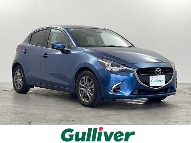 マツダ デミオ XDテーラードブラウン 栃木県 2018(平30)年 4万km エターナルブルーマイカ 純正ナビ/（FM/AM/BT/TV/CD/DVD）/マツダセーフティセンス/・衝突軽減ブレーキ/・レーンキープアシスト/・横滑り防止/・クルーズコントロール/全方位カメラ/ETC2.0/ターボ/純正アルミホイール/オートＬＥＤヘッドライト/パドルシフト/シートヒーター（運転席・助手席）/ドライブレコーダー/プッシュスタート/スペアスマートキー