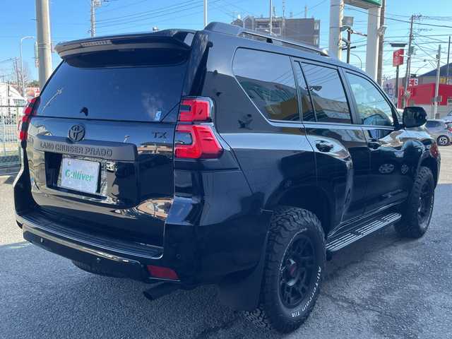 トヨタ ランドクルーザー プラド TX Lパッケージ 神奈川県 2023(令5)年 1.1万km ブラック ワンオーナー/プッシュスタート/ビルトインETC2.0/4WD/純正ナビ/Bluetooth接続/AM/FM/地デジTV/クリアランスソナー/アラウンドビューモニター/レーダークルーズコントロール/プリクラッシュ/車線逸脱防止装置/横滑り防止装置/D.N席パワーシート/D.N席シートヒーター、クーラー/オートライト、ハイビーム/LEDライト、フォグライト/サンルーフ/電動格納ミラー